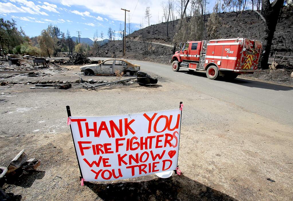 A sign thanking firefighters in Middletown on Thursday, Sept. 24, 2015. (KENT PORTER/ PD)