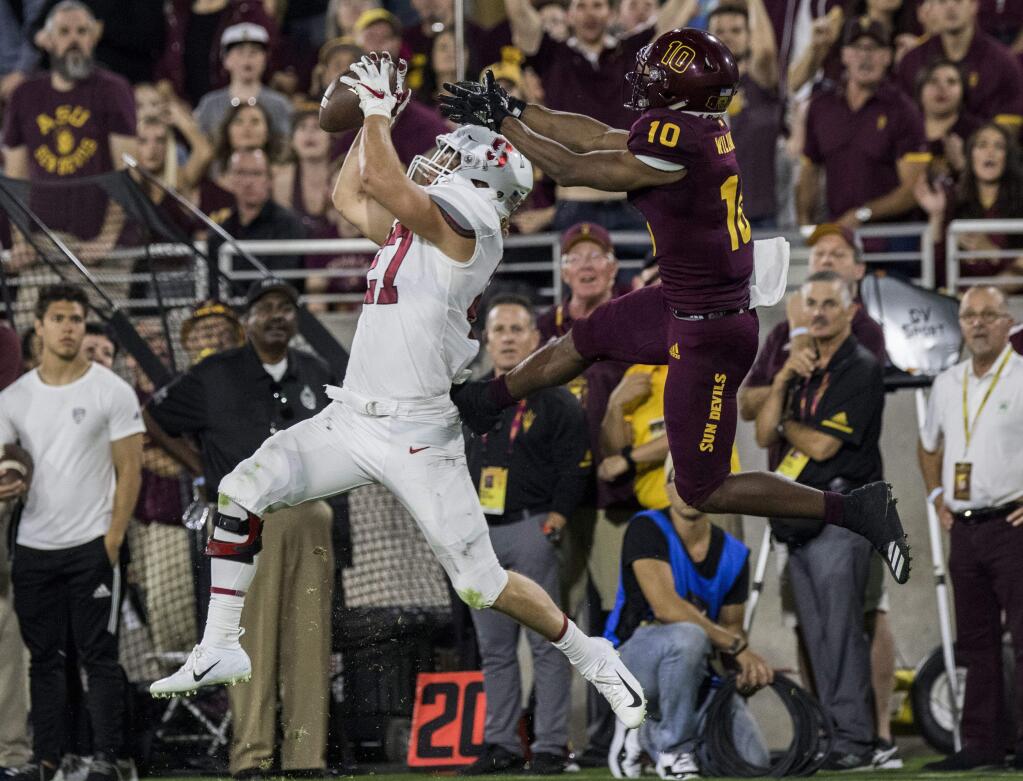 Stanford's Sean Barton intercepts a pass intended for Arizona State's Kyle Williams during the first half Thursday, Oct. 18, 2018, in Tempe, Ariz. (AP Photo/Darryl Webb)