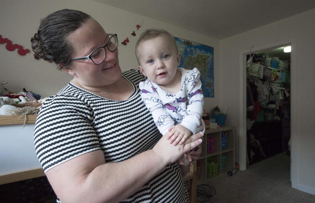 Rachel Hairston-Loveridge of Sonoma, with her 11-month-old daughter Helen, who was born at the Sonoma Valley Hospital. (Photo by Robbi Pengelly/Index-Tribune)