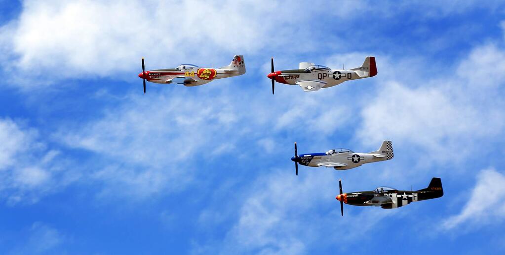 P-51 warbirds make a flyby during Wings Over Wine Country at the Charles M. Schulz-Sonoma County Airport in Santa Rosa in 2013. (KENT PORTER/ PD FILE)