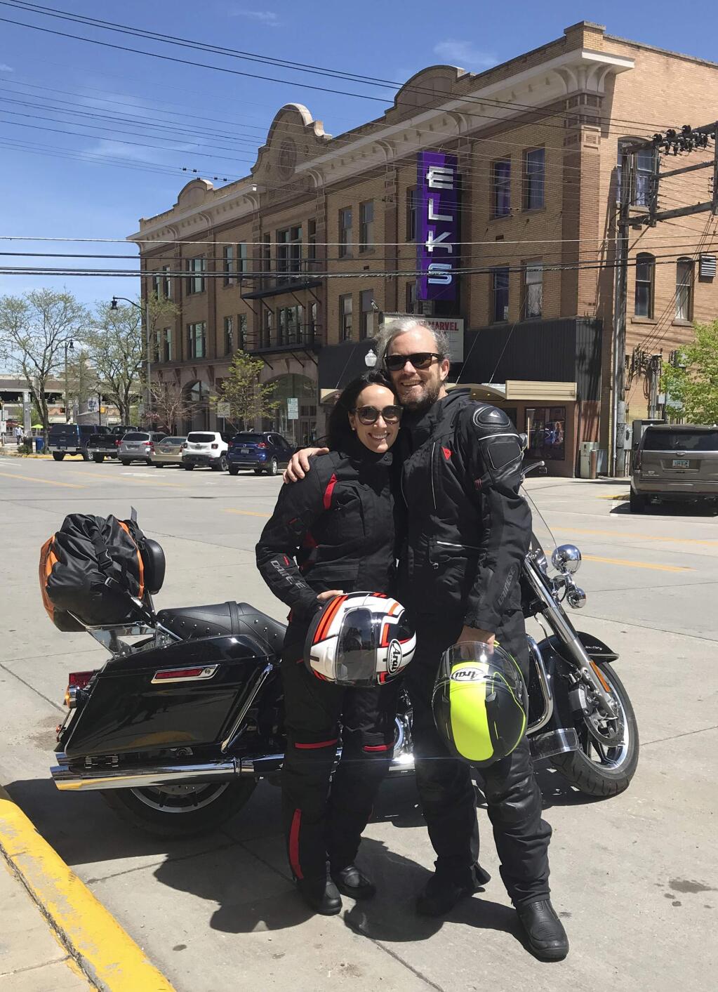 In this photo taken May 26, 2019, Jaclyn Trop is with automotive journalist Davey G. Johnson in Rapid City, South Dakota. (Jaclyn Trop via AP)