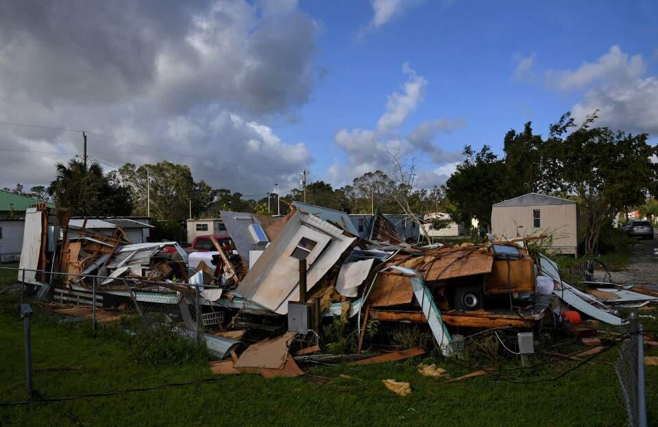 A trailer flattened by Hurricane Irma sits in a mobile home park in Immokalee, Florida. (MICHAEL S. WILLIAMSON / Washington Post)
