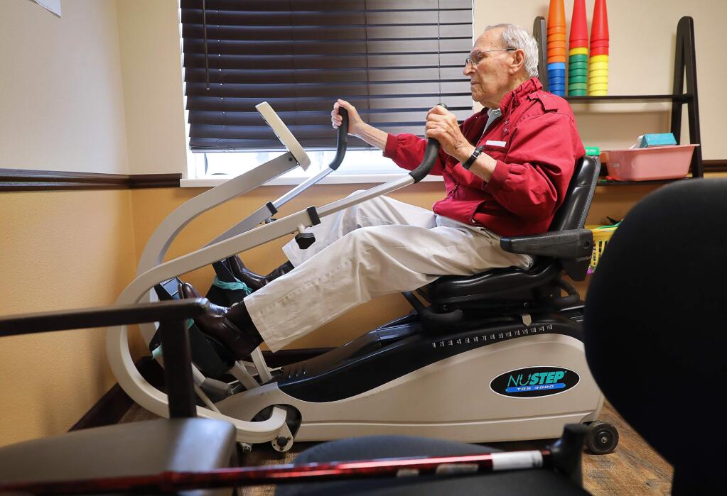 Del Tiedeman, 98, exercises at Healdsburg Senior Living in Healdsburg on Friday, May 24, 2019. Tiedeman piloted a C-47 with paratroopers on D-Day during World War II. (Christopher Chung/ The Press Democrat)