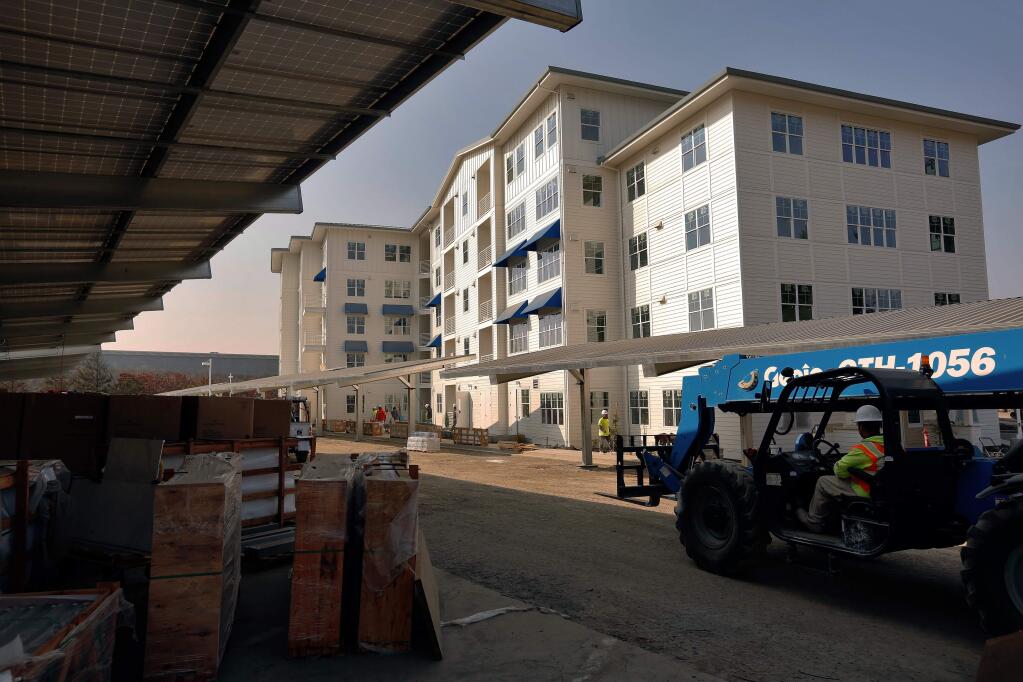 Construction continues on the Marina Apartments in Petaluma on Nov. 14. Sonoma State University plans to purchase the new complex for staff and faculty housing. (ALVIN JORNADA / The Press Democrat)
