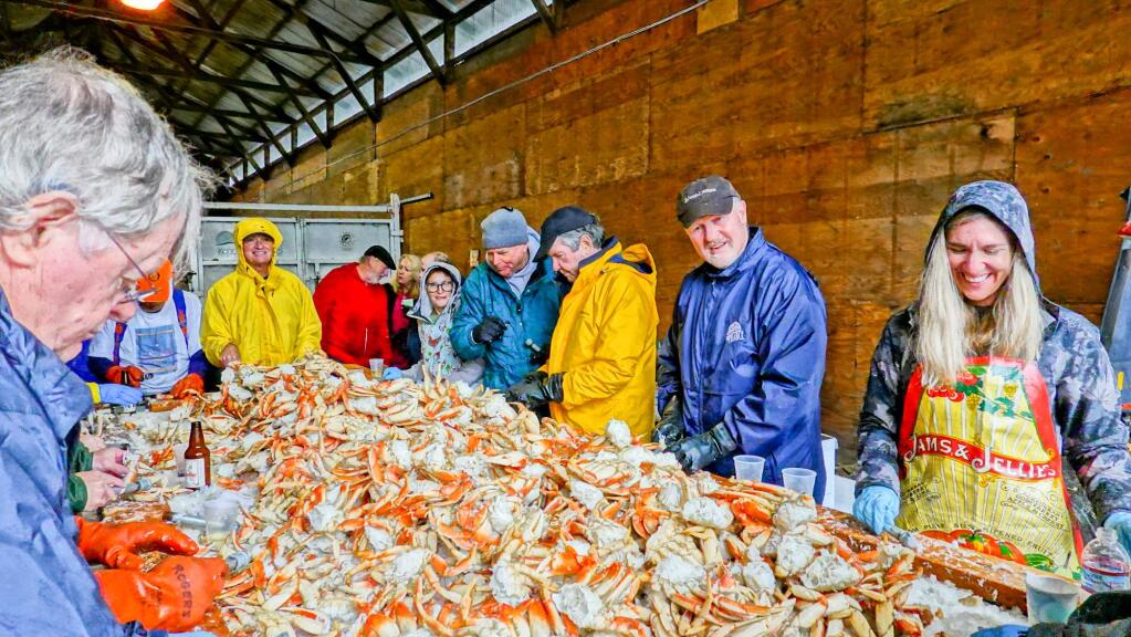 Sebastopol Rotary members crack crab for their 2019 benefit feed. (Harvey Henningsen)