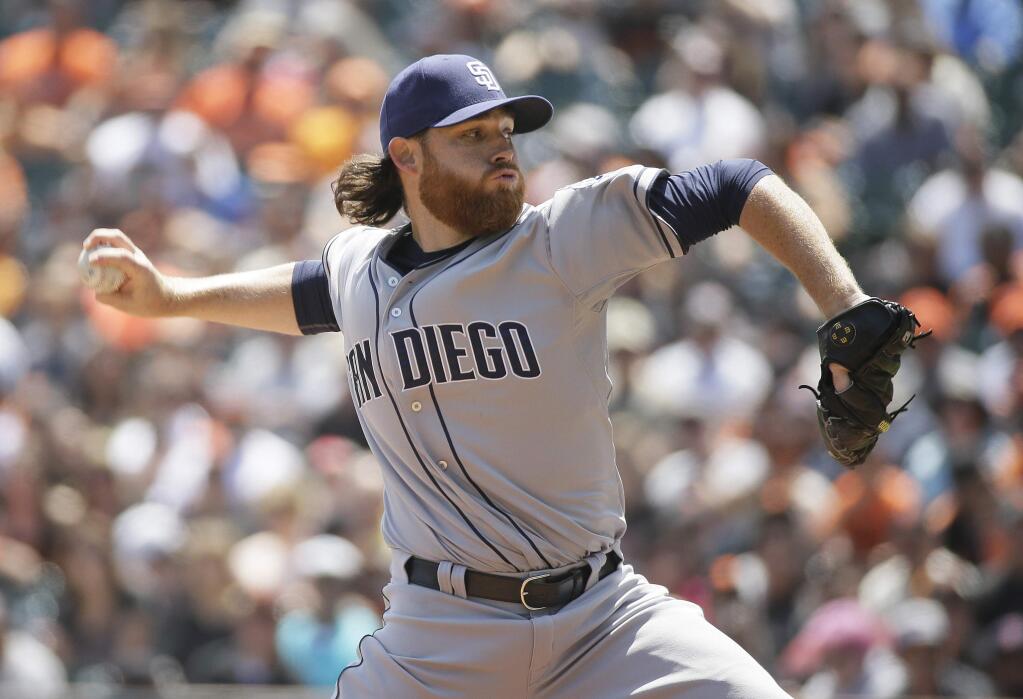 San Diego Padres starting pitcher Ian Kennedy throws against the San Francisco Giants in the first inning of their baseball game Wednesday, May 6, 2015, in San Francisco. (AP Photo/Eric Risberg)