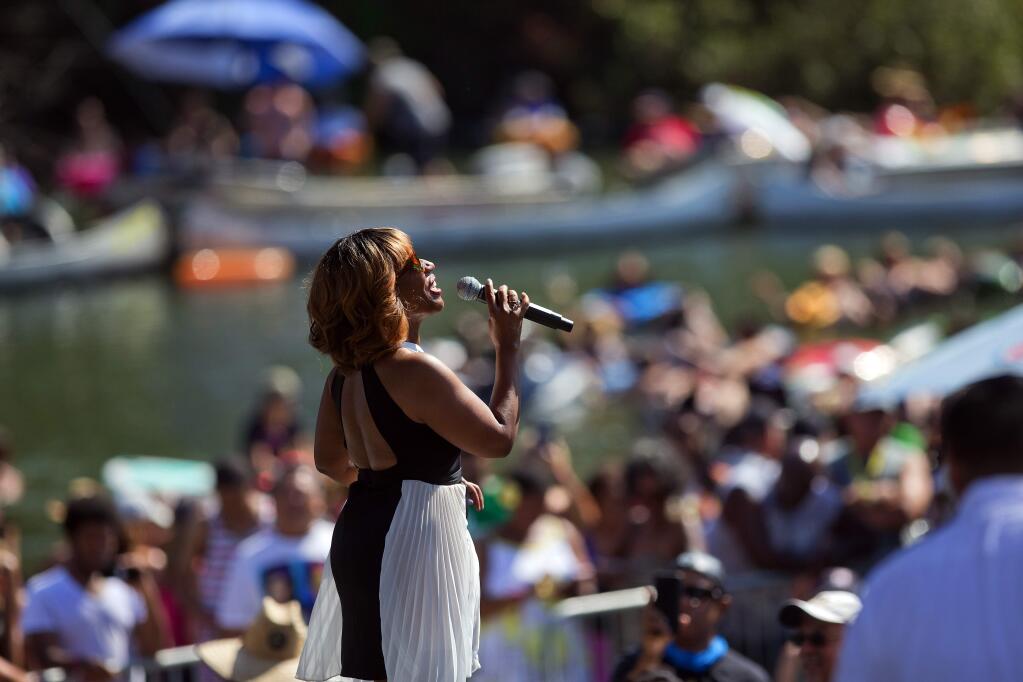 Stephanie Mills gets the crowd at Johnson's Beach in Guerneville moving with her grammy winning song 'Never Knew Love Like This Before' at the Russian River Jazz & Blues Festival on Saturday. (John Burgess/The Press Democrat)