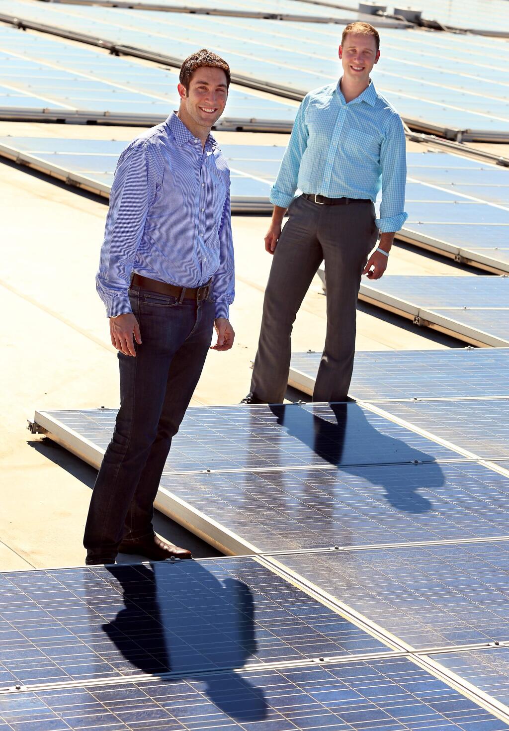 Soligent chief executive officer Jonathan Doochin, left, and chief operating officer Mark Laabs. Soligent is one of the nation's largest distributors of solar equipment and services.