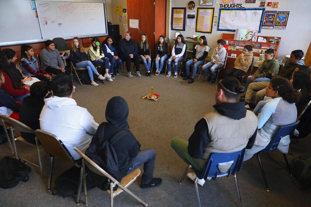 A restorative classroom circle meets at Lawrence Cook Middle School in Santa Rosa on Wednesday, November 28, 2018. (Christopher Chung/ The Press Democrat)