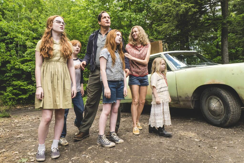 This image released by Lionsgate shows, from left, Sadie Sink, Charlie Shotwell, Ella Anderson, foreground center, Woody Harrelson, Naomi Watts and Eden Grace Redfield in 'The Glass Castle.' ( Jake Giles Netter/Lionsgate via AP)