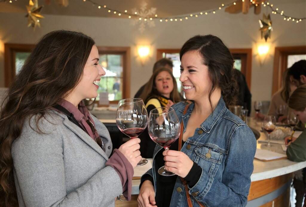 College roommates Sara Gallegher (left) and Emily Brown have made the Winter Wineland an annual tradition. The photograph was taken in 2018. This year's Annual Winter WINEland, now in its 27th year, is on Jan. 19 & 20. Winelovers will have access to 100-plus wineries and meet winemakers while tasting limited production wines and new releases. (Photo Will Bucquoy/for the Press Democrat).