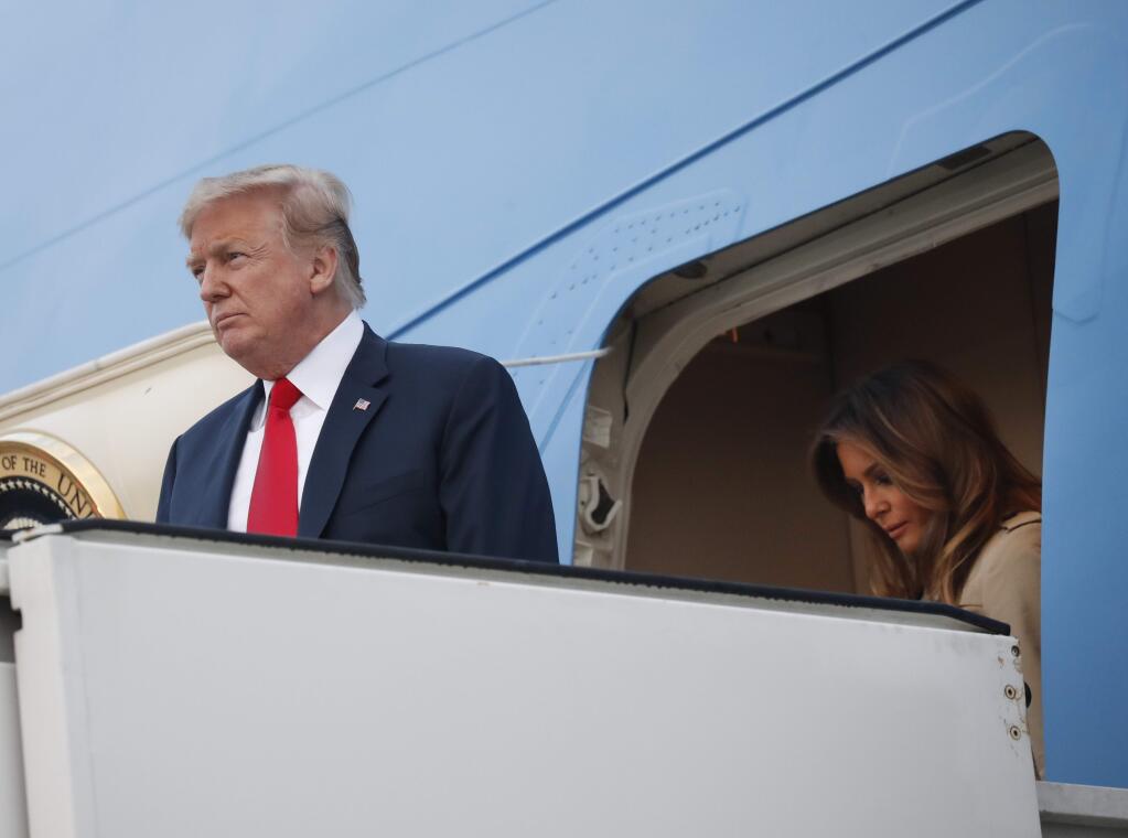 President Donald Trump and Melania Trump arrive on Air Force One at Melsbroek Air Base, Tuesday, July 10, 2018, in Brussels, Belgium. (AP Photo/Pablo Martinez Monsivais)