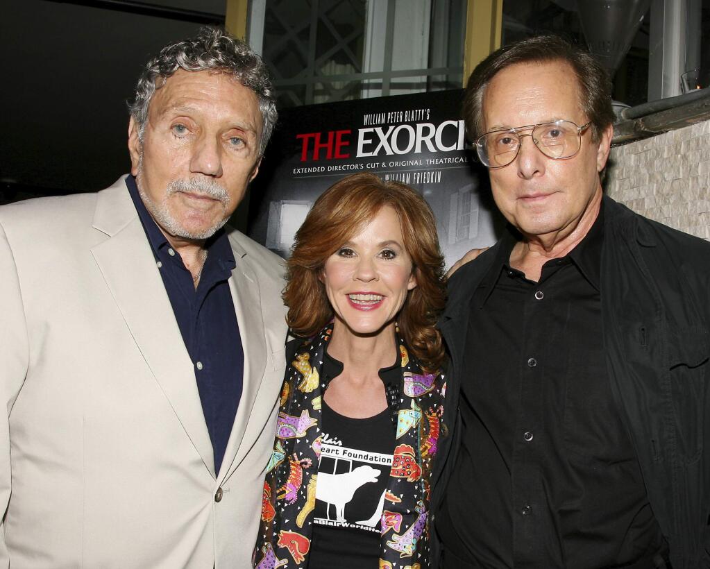 FILE - In this Sept. 29, 2010 file photo released by Starpix, 'The Exorcist' author William Peter Blatty, left, joins Linda Blair, who starred in the 1973 film and William Friedkin, the film's director, at a screening of the remastered film at the Museum of Modern Art in New York. Blatty died, Thursday, Jan. 12, 2017, at a hospital in Bethesda, Md, of multiple myeloma, a form of blood cancer, according to his wife Julie. He was 89. (Dave Allocca/Starpix via AP, File)