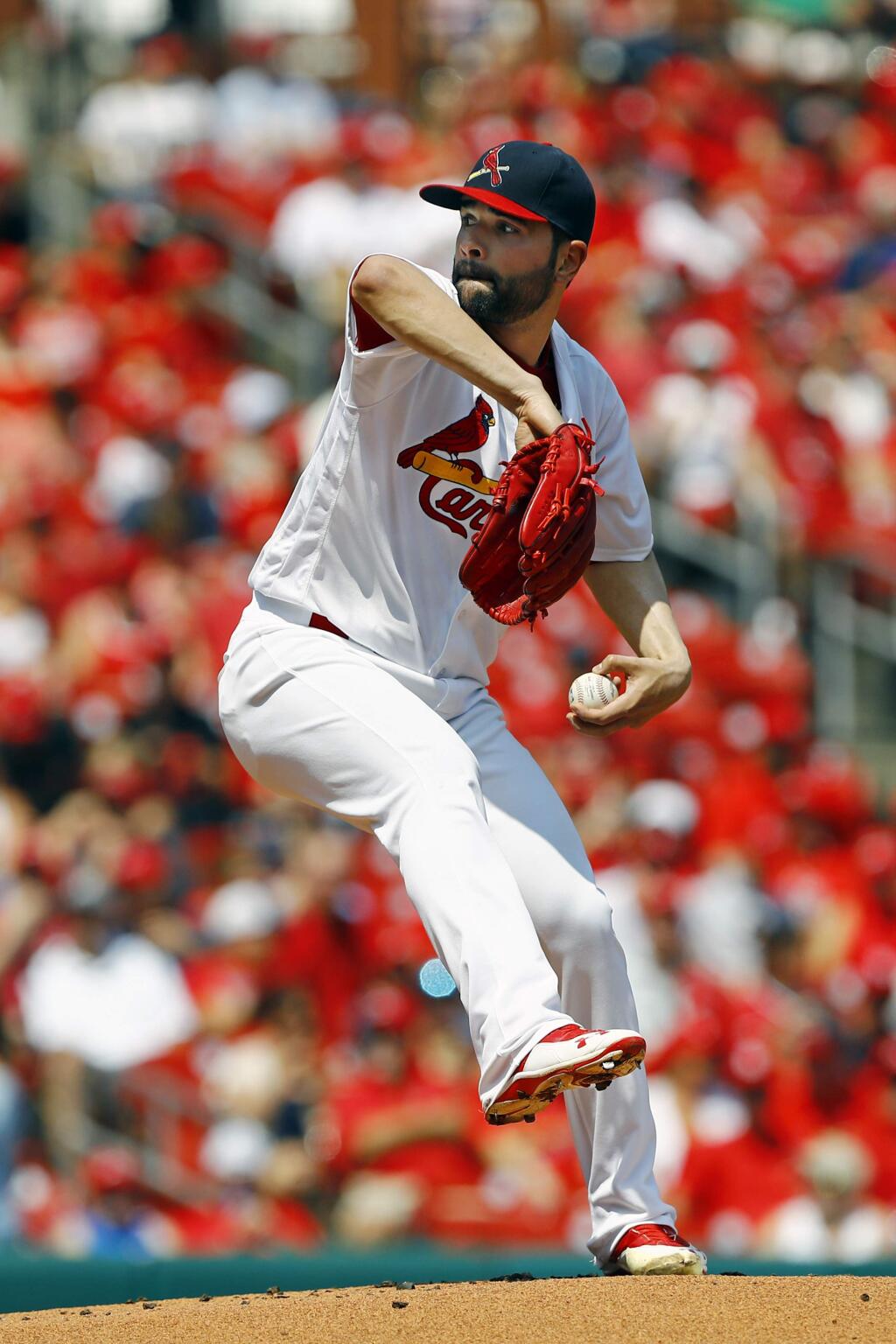St. Louis Cardinals starting pitcher Jaime Garcia throws during the first inning of a baseball game against the Oakland Athletics, Sunday, Aug. 28, 2016, in St. Louis. (AP Photo/Billy Hurst)