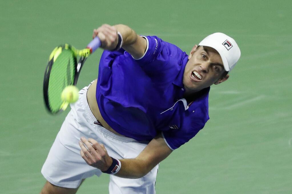 Sam Querrey, of the United States, serves against Mischa Zverev, of Germany, during the fourth round of the U.S. Open tennis tournament, Sunday, Sept. 3, 2017. (AP Photo/Adam Hunger)