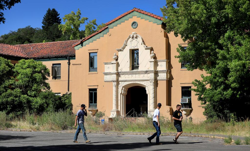 A shuttered Community Hospital on Chanate Road is becoming overgrown with vegetaion in Santa Rosa, Friday, July 19, 2019. (Kent Porter / The Press Democrat) 2019