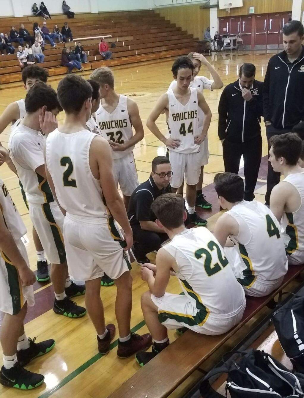 JOHN JACKSON/ARGUS-COURIER STAFFCoach Jake Lee gives instructions to Casa Grande's Gauchos during their game against Elsie Allen, a game Casa won in Piner's Sonoma County Classic.