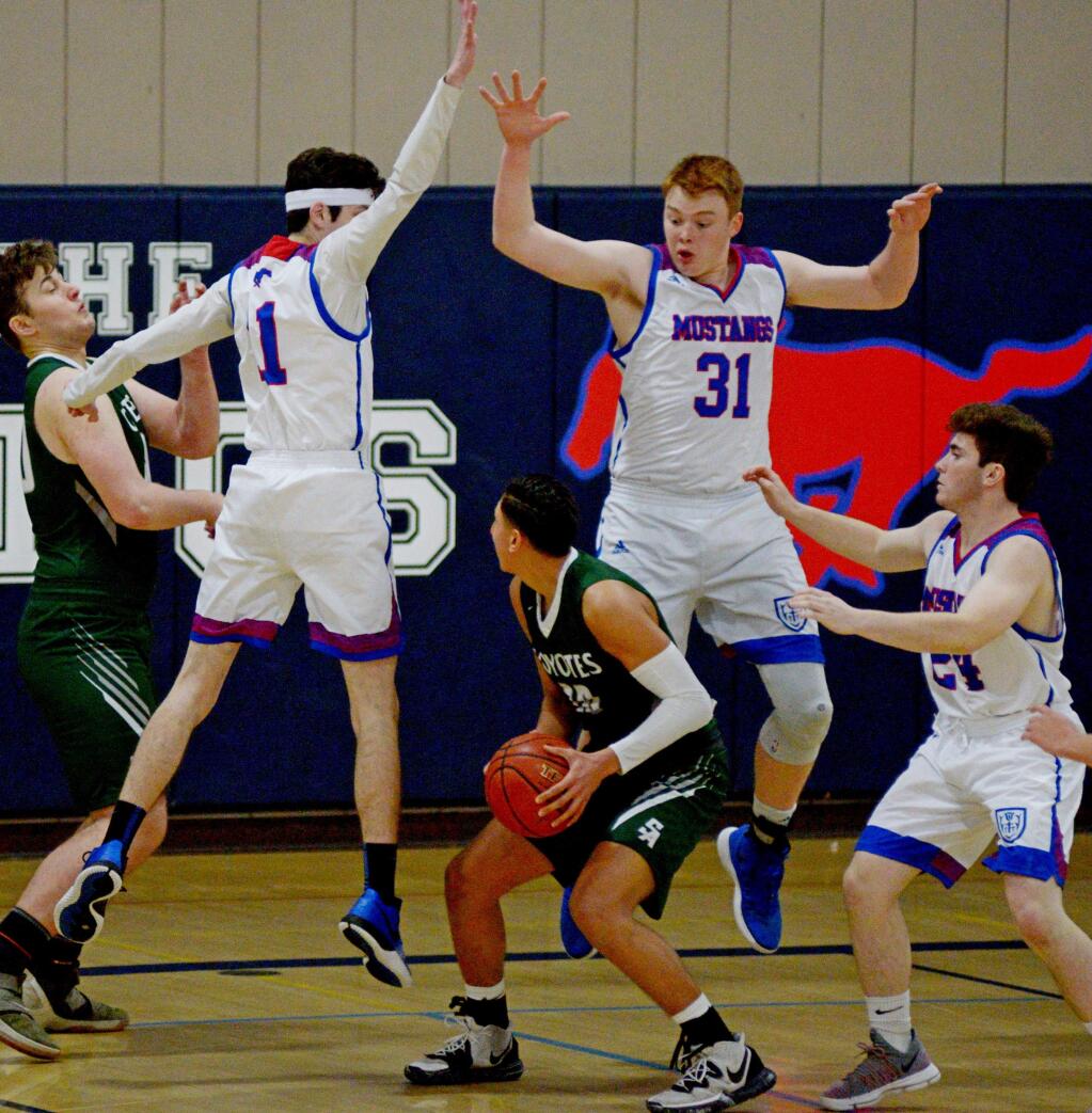 SUMNER FOWLER/FOR THE ARGUS-COURIERSt. Vincent defenders surround Sonoma Academy ball handler in a game won by Sonoma Academy.