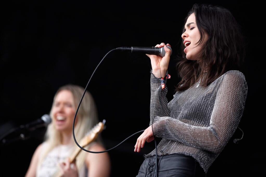 The Aces lead vocalist Cristal Ramirez, right, and guitarist Katie Henderson perform on the JaM Cellars Stage during the second day of BottleRock Napa Valley, in Napa, California, on Saturday, May 26, 2018. (Alvin Jornada / The Press Democrat)