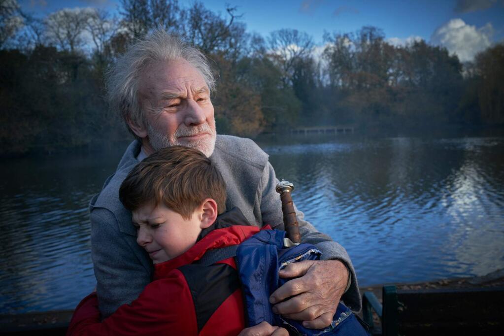 Louis Ashbourne Serkis as Alex and Patrick Stewart as Merlin in 'The Boy Who Would Be King.' (20th Century Fox)