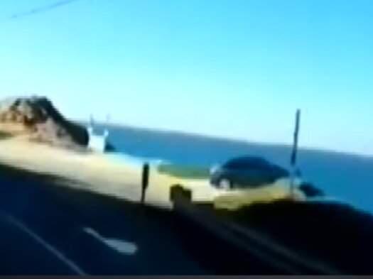 Video from KPIX-TV showing a vehicle crashing off a cliff in San Mateo County, Monday, Dec. 30, 2019. (KPIX/ YOUTUBE)