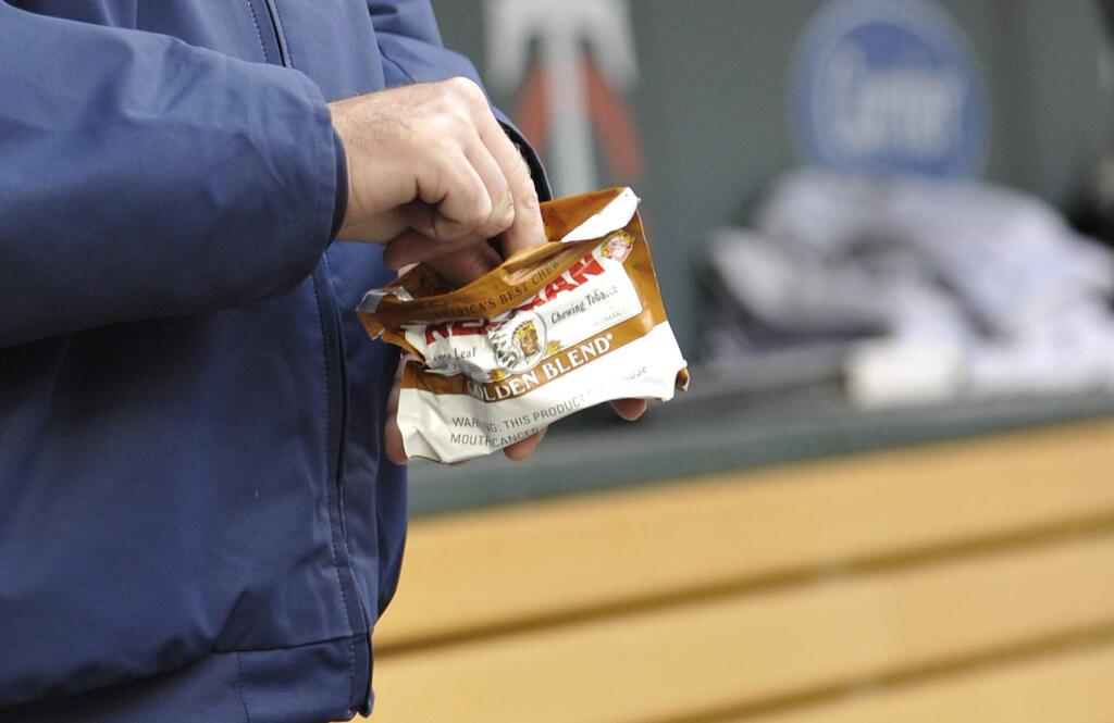 Chewing tobacco will not be allowed on major league baseball fields beginning in the upcoming season. (Associated Press)