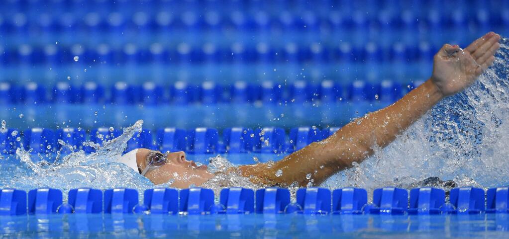 Maya DiRado swims in a preliminary heat in the women's 400-meter individual medley at the U.S. Olympic swimming trials, Sunday, June 26, 2016, in Omaha, Neb. (AP Photo/Mark J. Terrill)
