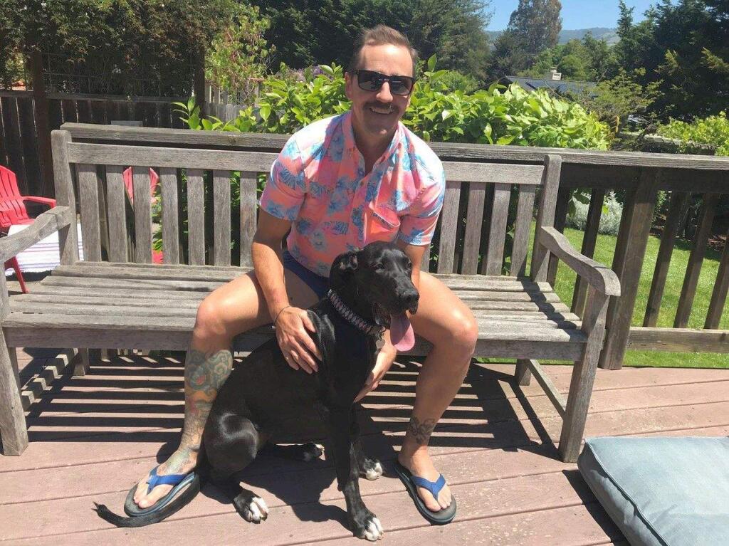 Petaluma resident Ryan Hepp poses for a photo with (dog). The 38-year-old police officer is a finalist for the 2019 Chubbies 'Man Model' contest. He's asking for the support of the community to help him receive enough votes to finish in the top 10. (COURTESY OF HEPP FAMILY)