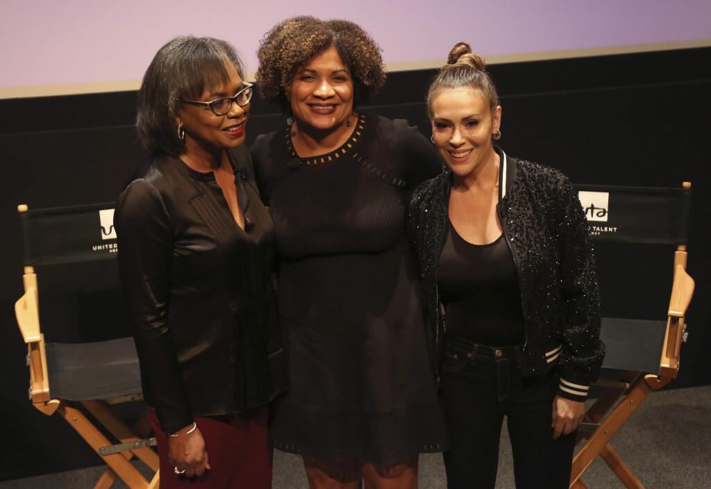 Anita Hill, from left, Fatima Goss Graves and Alyssa Milano pose for a photo at a discussion about sexual harassment and how to create lasting change from the scandal roiling Hollywood at United Talent Agency on Friday, Dec. 8, 2017, in Beverly Hills, Calif. (Photo by Willy Sanjuan/Invision/AP)