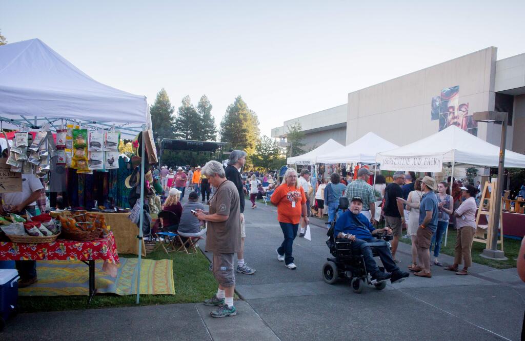 People gather for EarleFest at the SOMO Village Event Center in Rohnert Park, Calif. Saturday, September 17, 2016. EarleFest is a fundraiser benefitting the Earle Baum Center of the Blind.