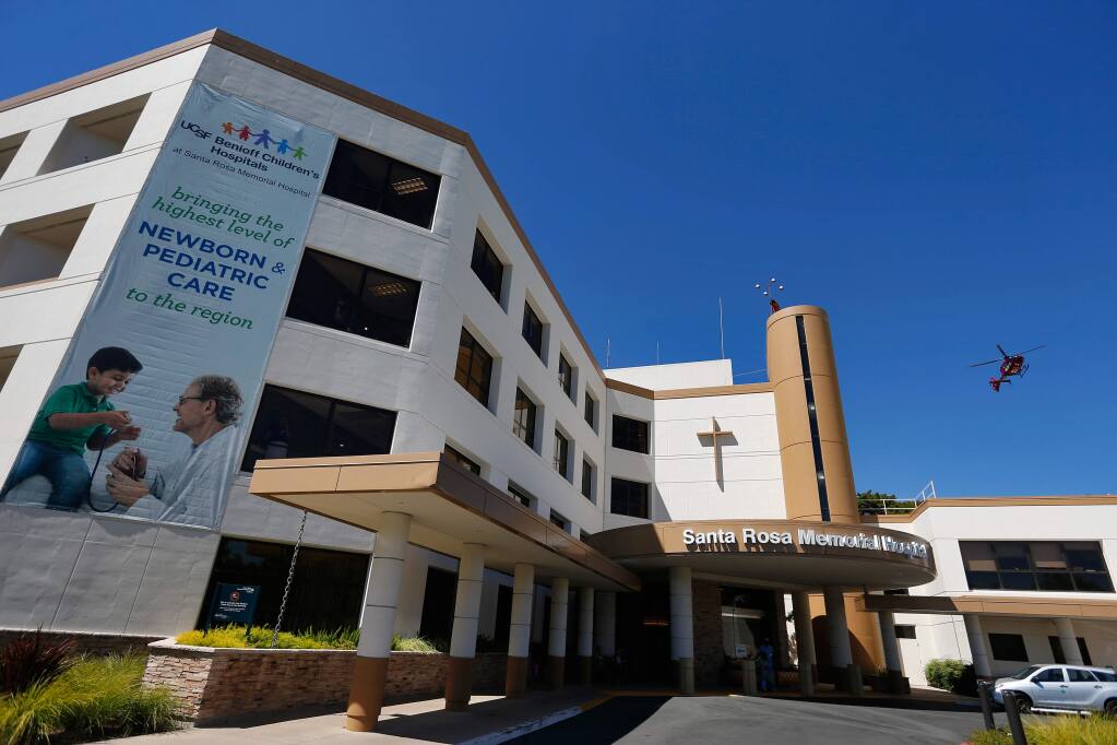 A banner on the side of Santa Rosa Memorial Hospital displays the recent partnership between Memorial and UCSF Benioff Children's Hospitals, at Santa Rosa Memorial Hospital in Santa Rosa, California on Friday, July 29, 2016. (Alvin Jornada / The Press Democrat)