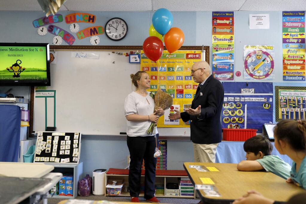 Special education teacher Katya Robinson is surprised by Sonoma County Superintendent Steve Herrington with the Sonoma County Teacher of the Year Award in her classroom at Park Side Elementary School in Sebastopol, California on Wednesday, April 24, 2019. (BETH SCHLANKER/The Press Democrat)