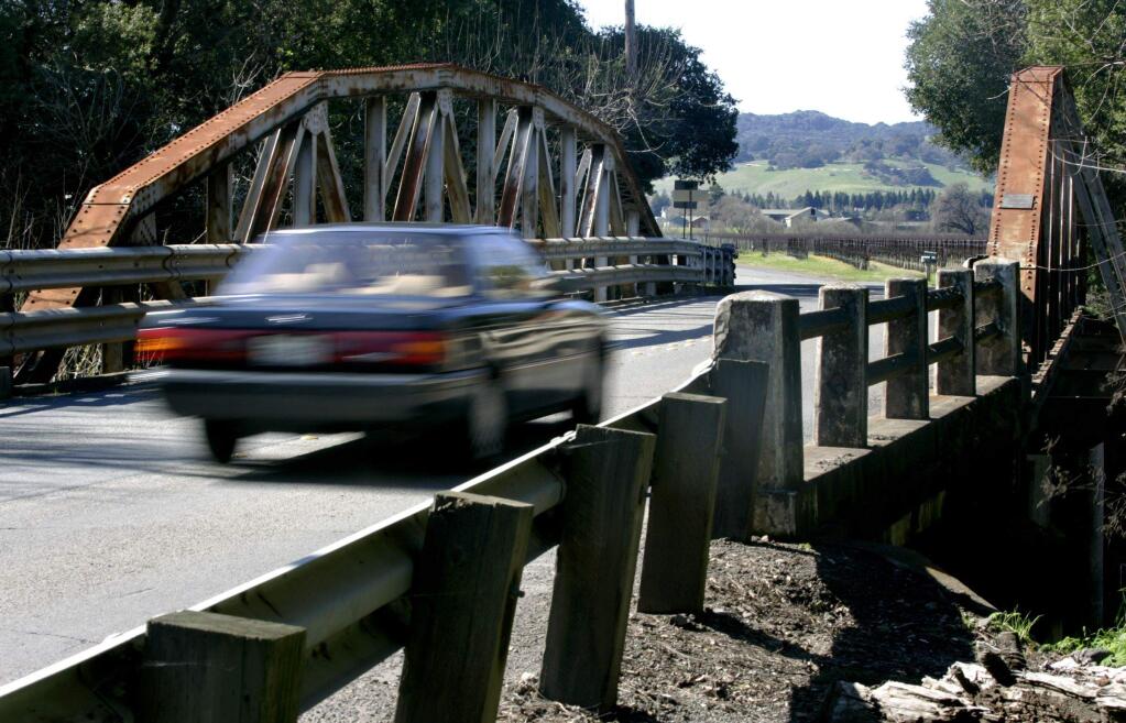 A car drives over the Watmaugh Bridge in Sonoma, California on Tuesday, February 22, 2011. (BETH SCHLANKER/ The Press Democrat)