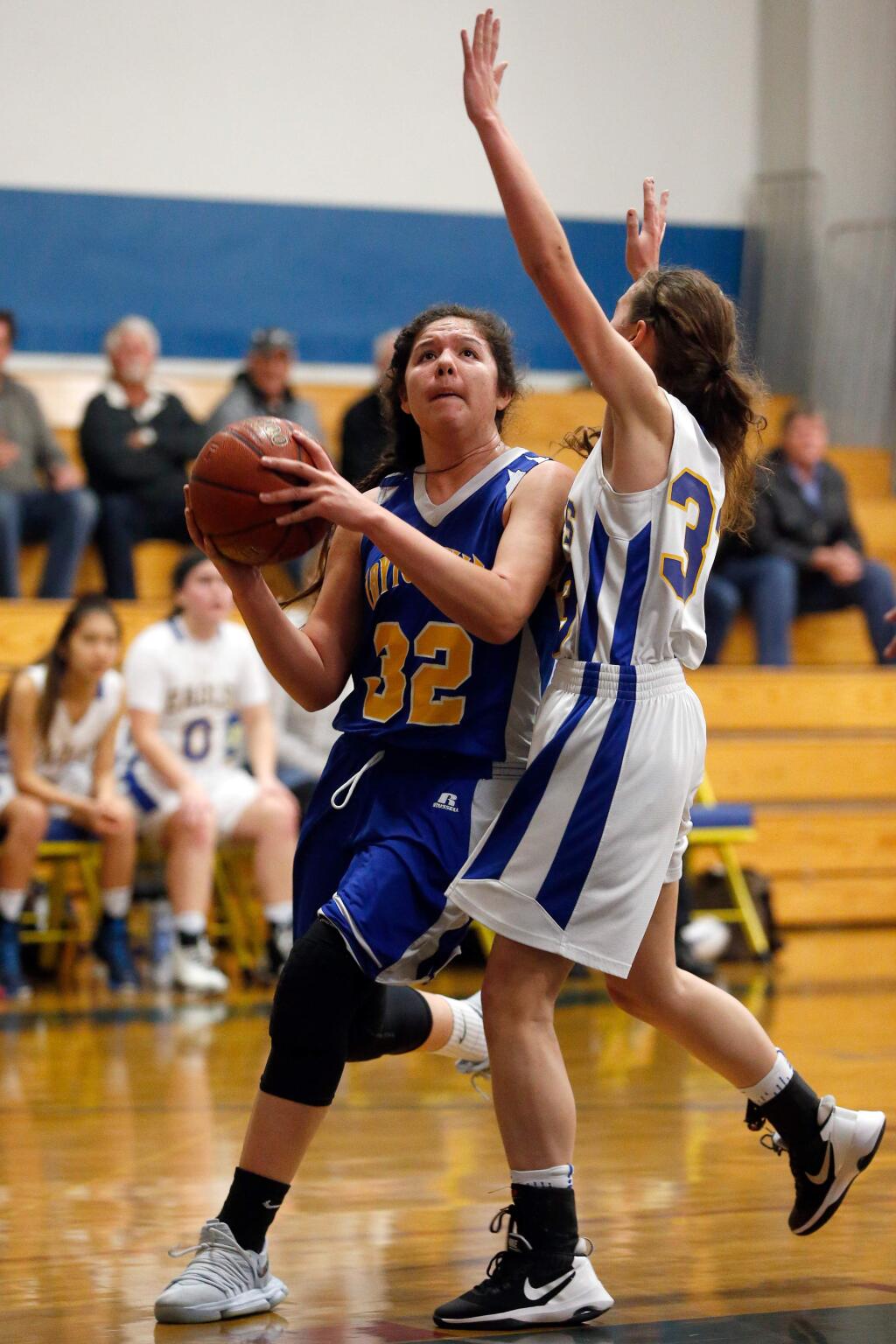 Laytonville's Akeela James, left, drives to the basket around Rincon Valley Christian's Anika Ahlstrom during the first half of the NCS Division 6 championship game in Santa Rosa on Saturday, March 3, 2018. (Alvin Jornada / The Press Democrat)