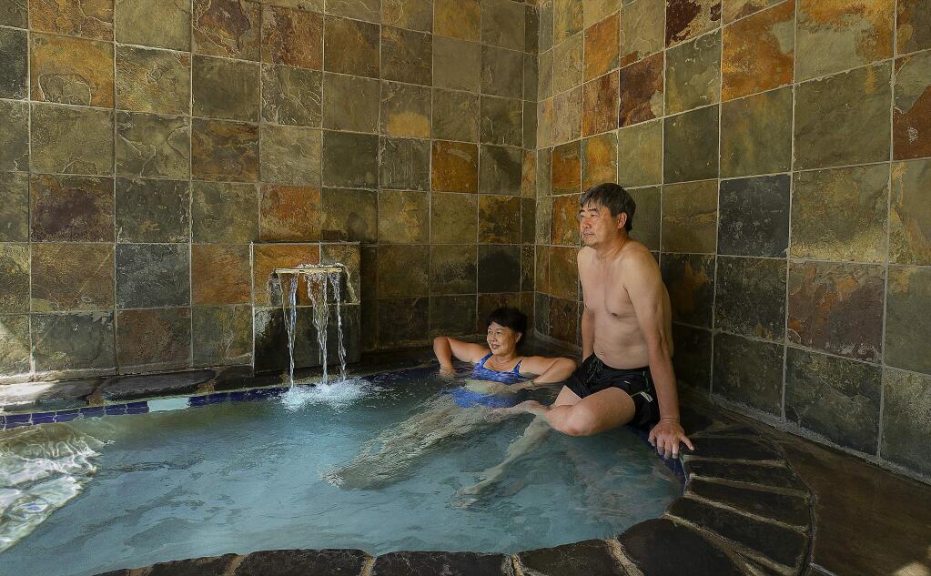 Guests at Orr Hot Springs can soak in the natural hot sulphur springs in private tubs or a large pool. Clothing is optional. (photo by John Burgess/The Press Democrat)