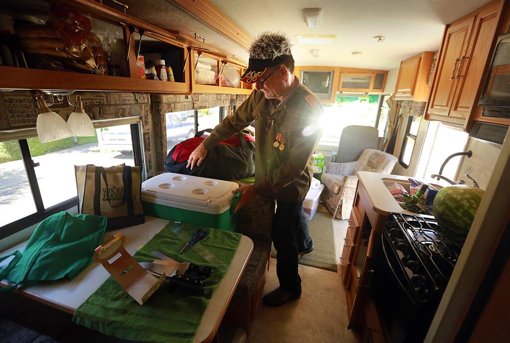 Scott Swanson of Bozeman, Mont., returned to Santa Rosa for his annual trip to burning man with friends. The group loaded their RV with water, liquor and outfits for the desert festival.