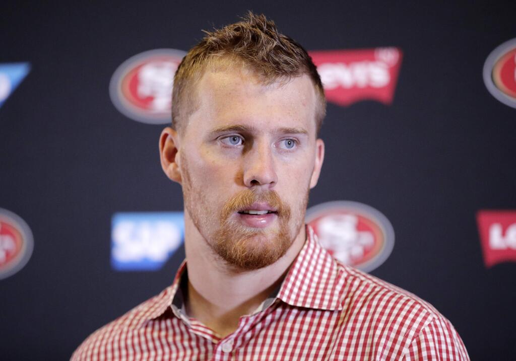 San Francisco 49ers quarterback C.J. Beathard speaks during a news conference following a 29-27 loss to the Los Angeles Chargers in an NFL football game, Sunday, Sept. 30, 2018, in Carson, Calif. (AP Photo/Jae Hong)