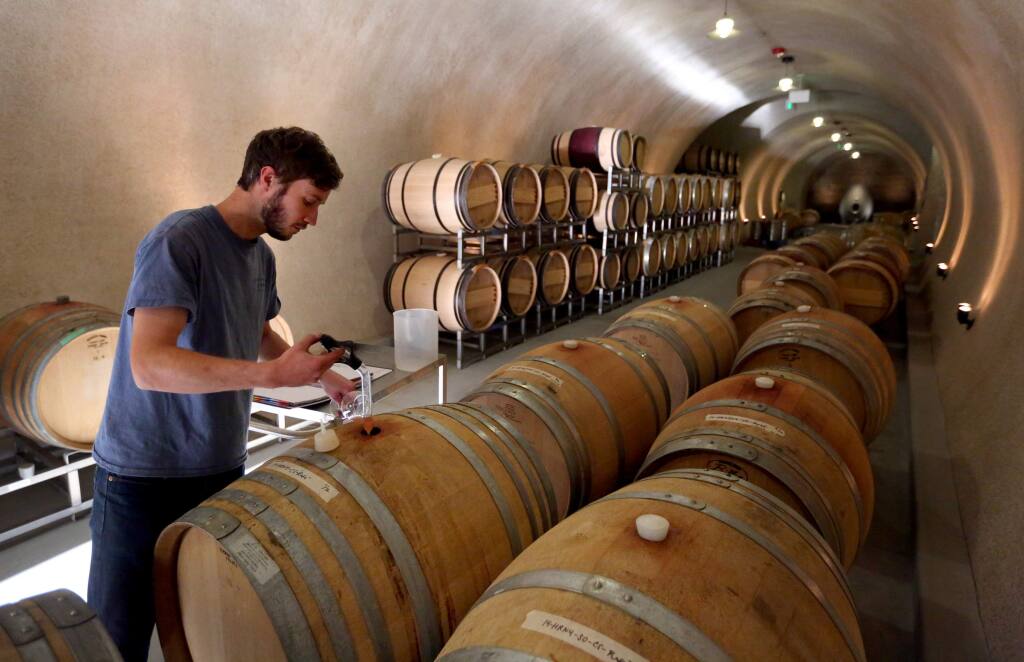 Winemaker John Hamel tastes a rose in the wine cave at Hamel Winery in Sonoma on Friday, Nov. 7, 2014. (CRISTA JEREMIASON/ PD)