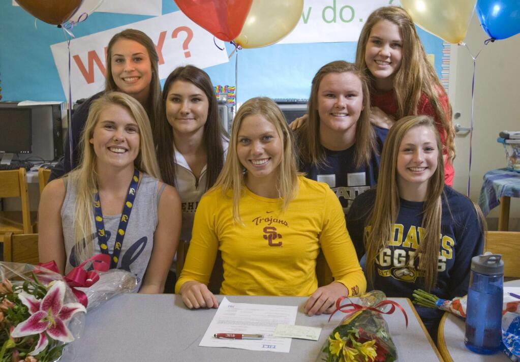 Scholarships can be found in all sports as these Petaluma High School student athletes from 2014 discovered. From left seated are Samantha LaMos, UC Berkeley rowing' Riley Scott, USC swimming; Kara Jones, UC Davis gymnastics; and standing from left, Joelle Krist, University of Arizona softball; Brie Gerhardt, LeHigh University softball; Allison Scranton, Utah State, track and field; and Maddie Meheiz, Western Oregon volleybal. (SCOTT MANCHESTER/ARGUS-COURIER STAFF)