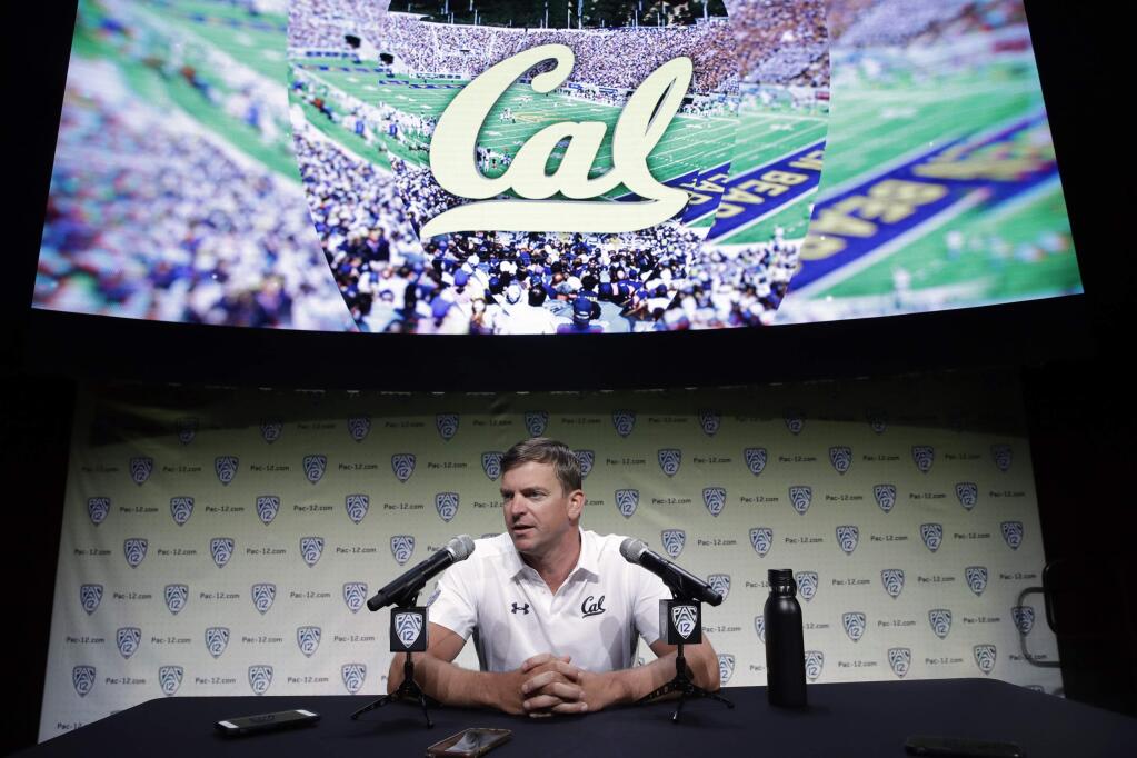 In this July 24, 2019, file photo, Cal head coach Justin Wilcox answers questions during the Pac-12 Media Day in Los Angeles. (AP Photo/Marcio Jose Sanchez, File)