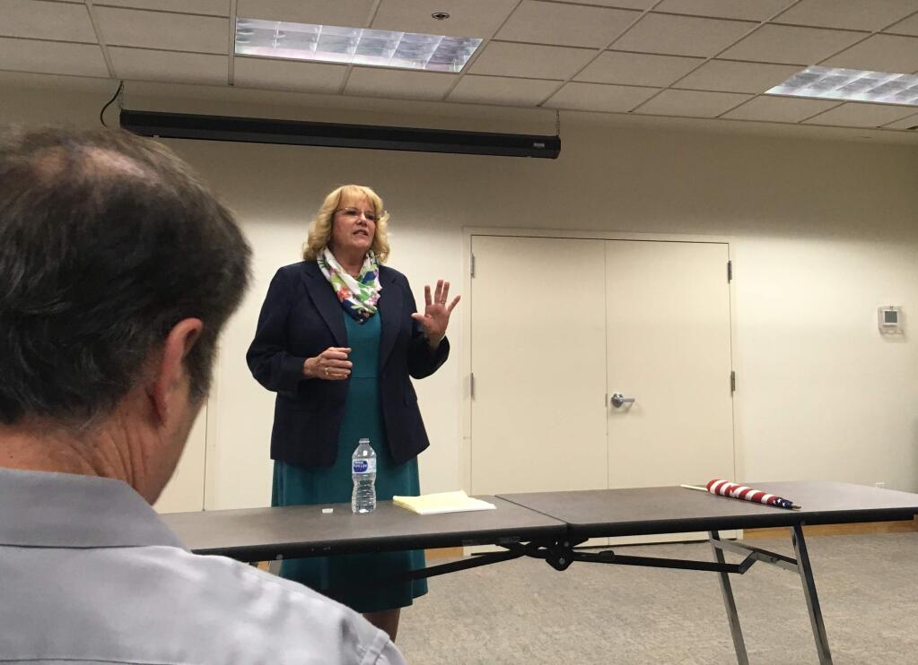 Susan Tully, national field director for the Federation for American Immigration Reform, addresses an audience of Sonoma County Republican Party members at the Finley Community Center on Wednesday, June 27, 2018. (Christi Warren/ The Press Democrat)