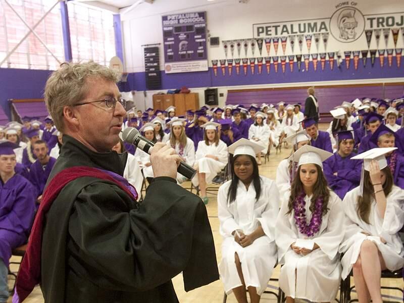Vice Principle David Stirrat talks with the graduates before the walk over the the graduation at Petaluma High School's Graduation at PHS in Petaluma on Saturday May 28, 2011.