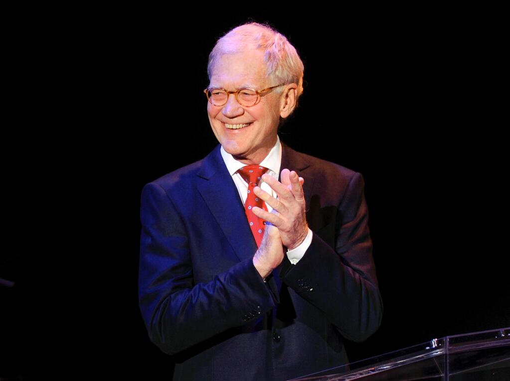 FILE - In this March 2, 2015 file photo, David Letterman attends 'An Evening of SeriousFun Celebrating the Legacy of Paul Newman', hosted by the SeriousFun Children's Network at Avery Fisher Hall in New York. After 33 years hosting late night talk shows, Letterman will retire on May 20. (Photo by Evan Agostini/Invision/AP, File)