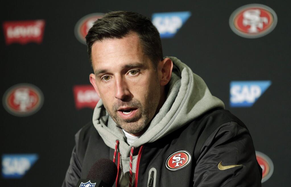San Francisco 49ers head coach Kyle Shanahan talks to reporters following an NFL football game against the Seattle Seahawks, Sunday, Dec. 2, 2018, in Seattle. The Seahawks won 43-16. (AP Photo/John Froschauer)