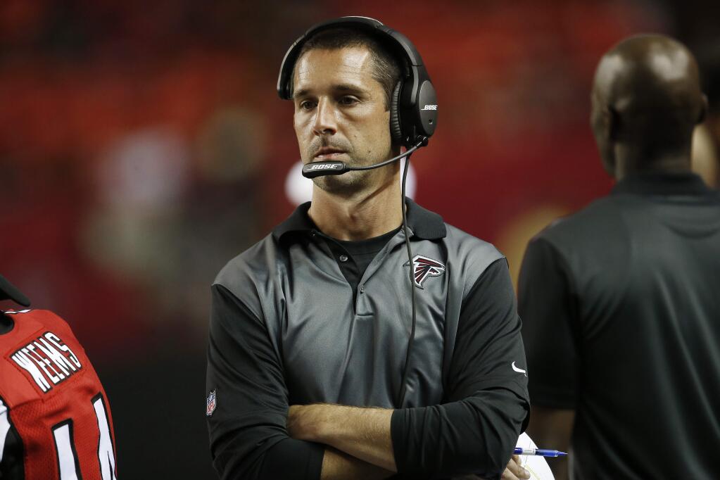 FILE - In this Sept. 3, 2015, file photo, Atlanta Falcons offensive coach Kyle Shanahan walks on the sidelines during the second half of an NFL football preseason game Baltimore Ravens, in Atlanta. The Falcons' six-game skid and offensive woes may have put offensive coordinator Kyle Shanahan's future with the team in jeopardy. (AP Photo/John Bazemore, File)