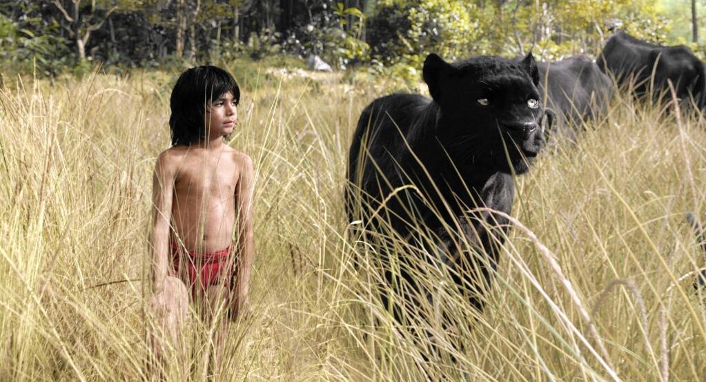 DisneyMowgli (Neel Sethi) and a computer generated photo-real panther Bagheera (voice of Ben Kingsley) embark on a journey in Jon Favreau's 'The Jungle Book.'