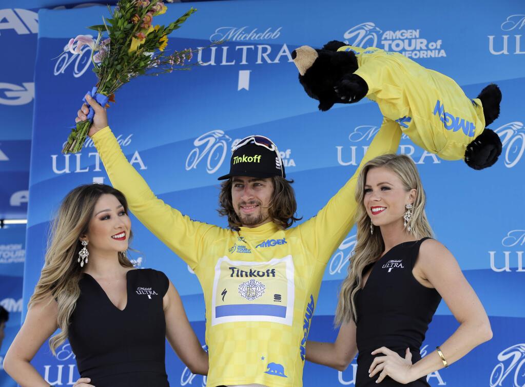 Peter Sagan, of Slovakia, poses on the podium after winning stage one of the Amgen Tour of California cycling race Sunday, May 15, 2016, in San Diego. (AP Photo/Gregory Bull)