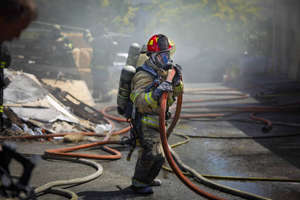 Petaluma, CA, USA._Thursday, July 18, 2019._Firefighters from throughout Petaluma and nearby participated in a training. Petaluma received a grant to replace the fire department’s self-contained breathing apparatuses. (CRISSY PASCUAL/ARGUS-COURIER STAFF)