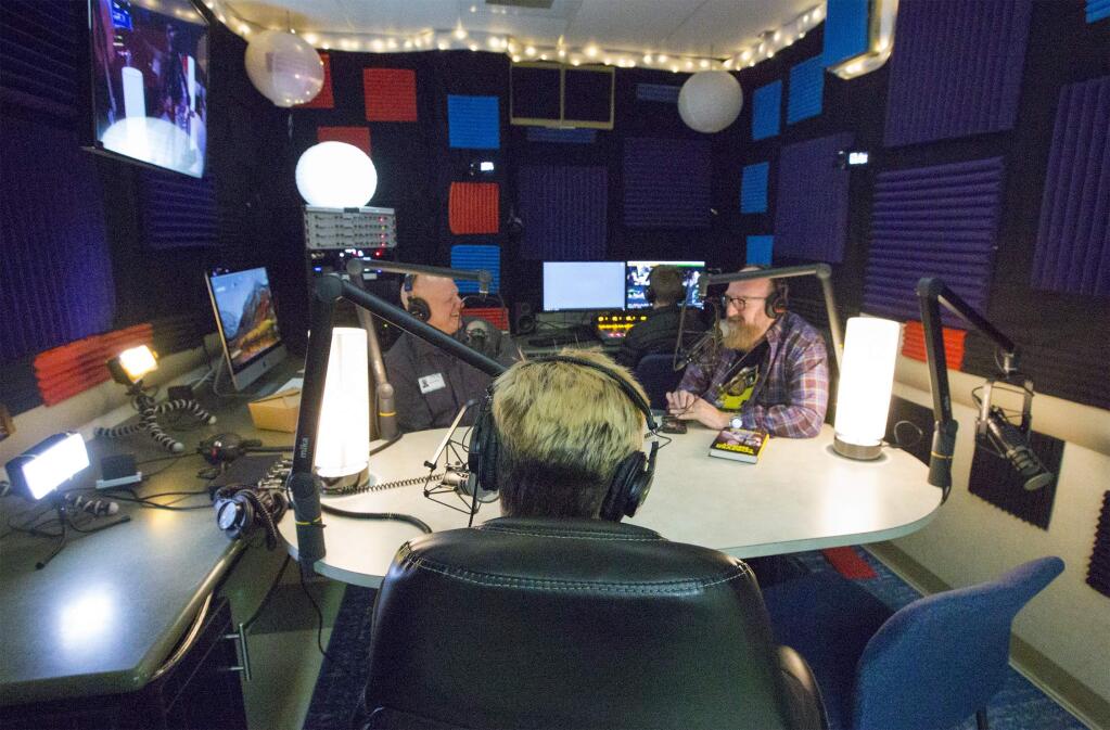 Students at Sonoma Valley High School make good use of the new podcast studio by recording a talk between professional comedians and SVHS alums Reed Martin, left, and Brian Posehn (Big Bang Theory). (Photo by Robbi Pengelly/Index-Tribune)
