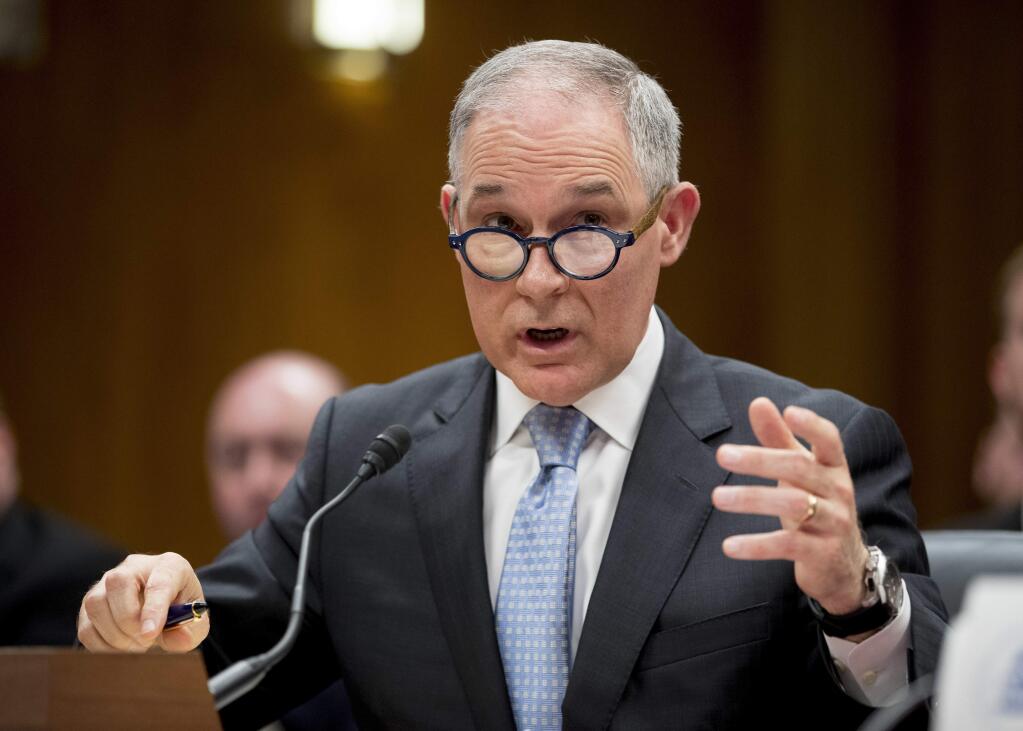 FILE - In this May 16, 2018, file photo, Environmental Protection Agency Administrator Scott Pruitt testifies on Capitol Hill in Washington. President Donald President Trump tweeted Thursday, July 5, he has accepted resignation of Pruitt. (AP Photo/Andrew Harnik, File)